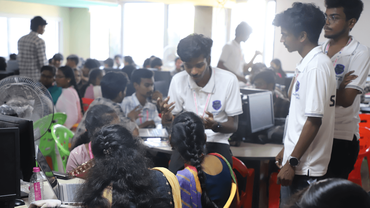 Teaching and mentoring participants at hackathon